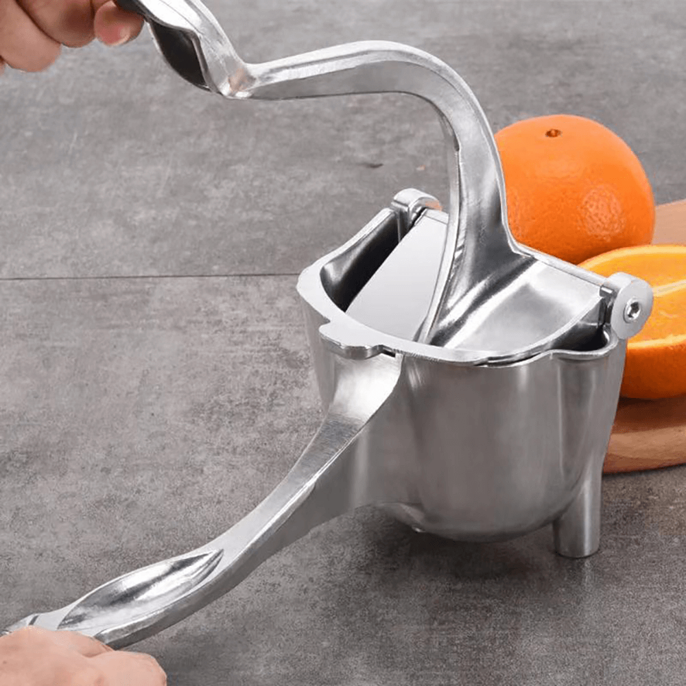 Manual hand citrus squeezer for effortless juicing, designed to extract maximum juice from lemons, limes, and oranges with minimal effort and mess.