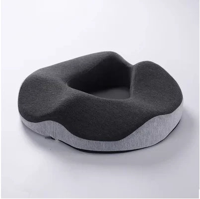 Ergonomic ring cushion for relieving pressure and discomfort, designed to provide support and comfort for sitting, ideal for hemorrhoid relief and post-surgery recovery.