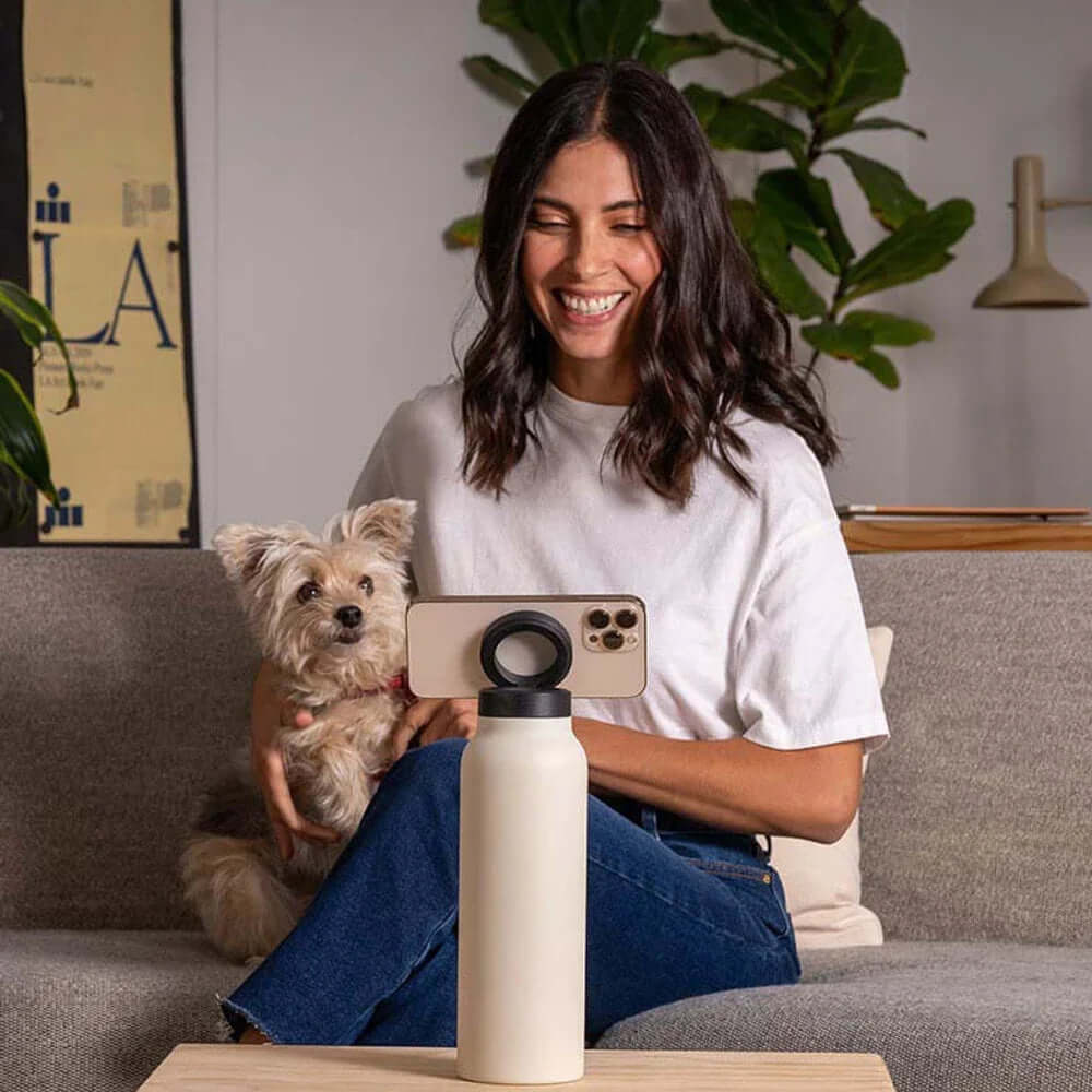 Water bottle with MagSafe phone holder, designed to keep your device securely attached while you stay hydrated, offering convenience and hands-free use during activities.