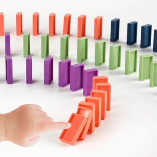 Automatic domino train for endless fun and creativity, designed to lay dominoes in a continuous line for an exciting and interactive play experience for all ages.