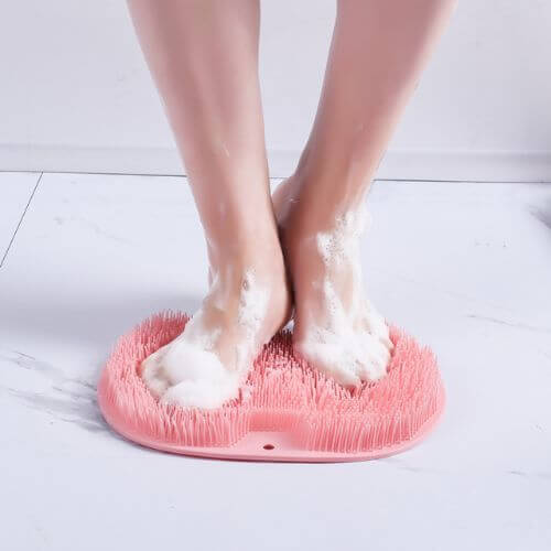 Foot massage and scrubbing mat for rejuvenating foot care, designed to exfoliate, stimulate circulation, and provide a relaxing massage for tired, sore feet.