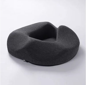 Ergonomic ring cushion for relieving pressure and discomfort, designed to provide support and comfort for sitting, ideal for hemorrhoid relief and post-surgery recovery.