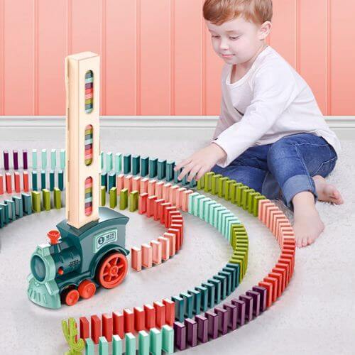 Automatic domino train for endless fun and creativity, designed to lay dominoes in a continuous line for an exciting and interactive play experience for all ages.