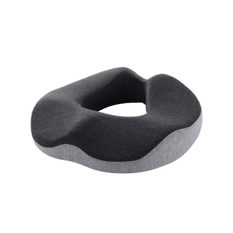 Ergonomic ring cushion for relieving pressure and discomfort, designed to provide support and comfort for sitting, ideal for hemorrhoid relief and post-surgery recovery.