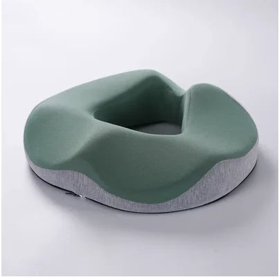 Ergonomic ring cushion for relieving pressure and discomfort, designed to provide support and comfort for sitting, ideal for hemorrhoid relief and post-surgery recovery.